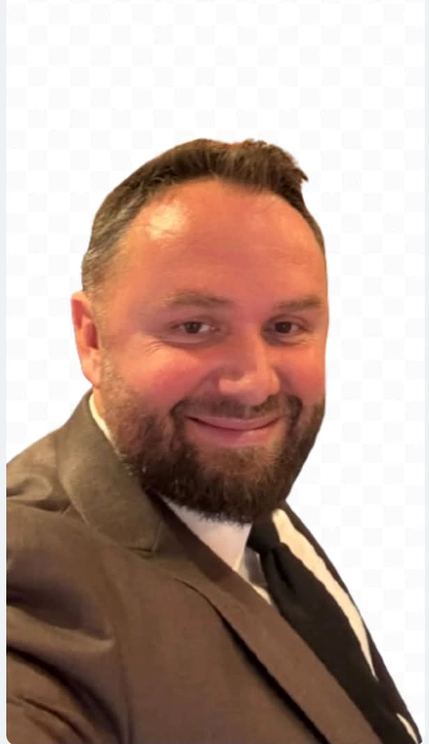 Dr. Ilir Hajdini, founder of Franchise Strategy, in a professional portrait